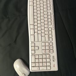 Logitech Pink mouse And Keyboard