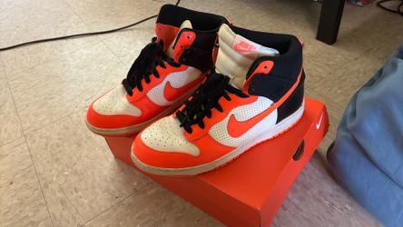 Neon orange Nike dunks