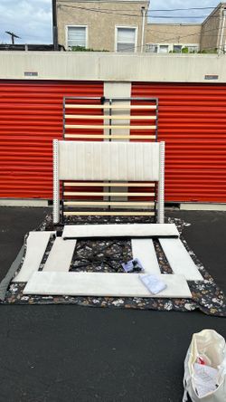 Queen Upholstered platform bed with tufted wing back headboard