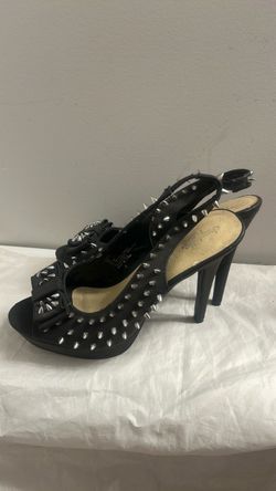 Charlotte Russe black pleather spike high heels featuring decorative bow on the open toe