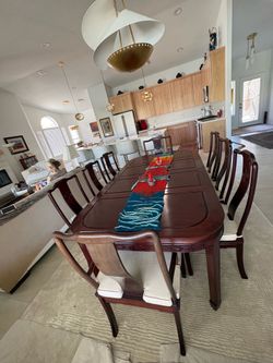 Rosewood table with 8 chairs