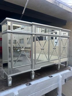 Mirrored  chest and dresser.