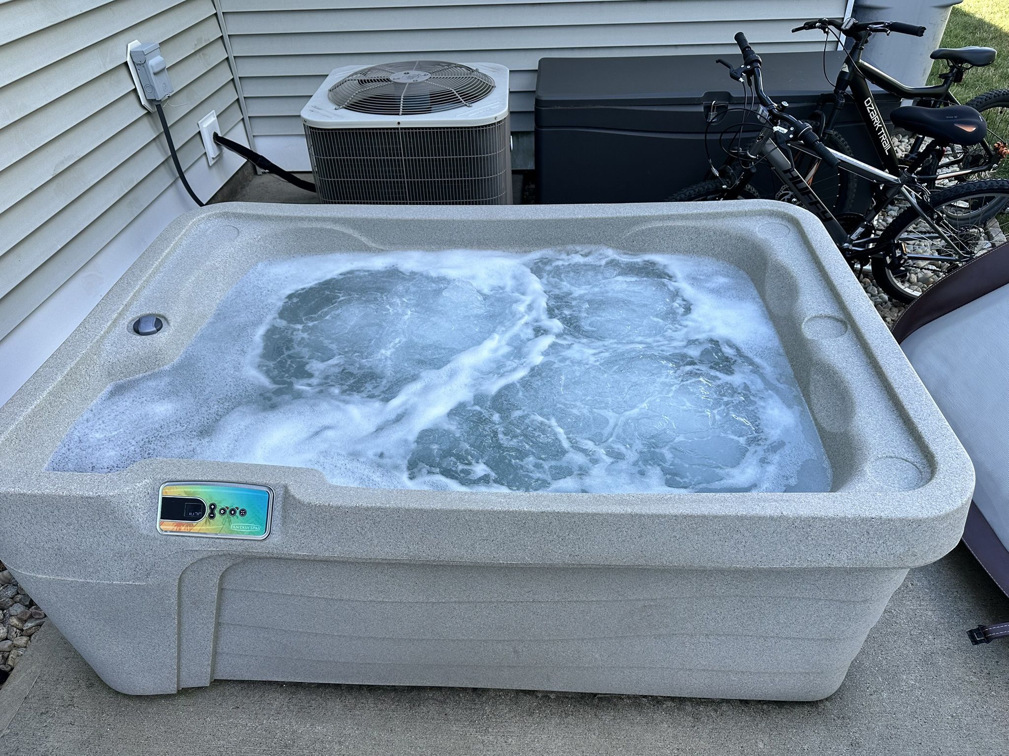 Two Person Hot Tub With Changing Colors and Jets