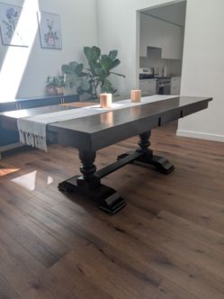 Hardwood dining room table with chairs