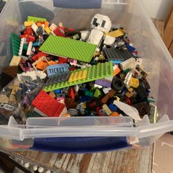 Two Containers Of Lego’s  Sold Separately 