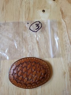 Leather shell patterned buckle