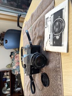 Canon FTb-QL 35mm SLR Camera with 50mm f/1.8 Lens and manual