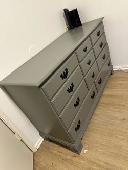 11 drawer dresser clean condition grey with a small matching night stand  250 OBO NEED GONE ASAP