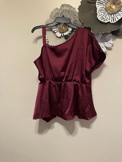Woman’s Burgundy blouse