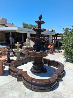 Concrete fountain with round base