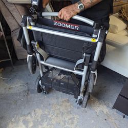 Zoomer foldable electric wheel chair 1499