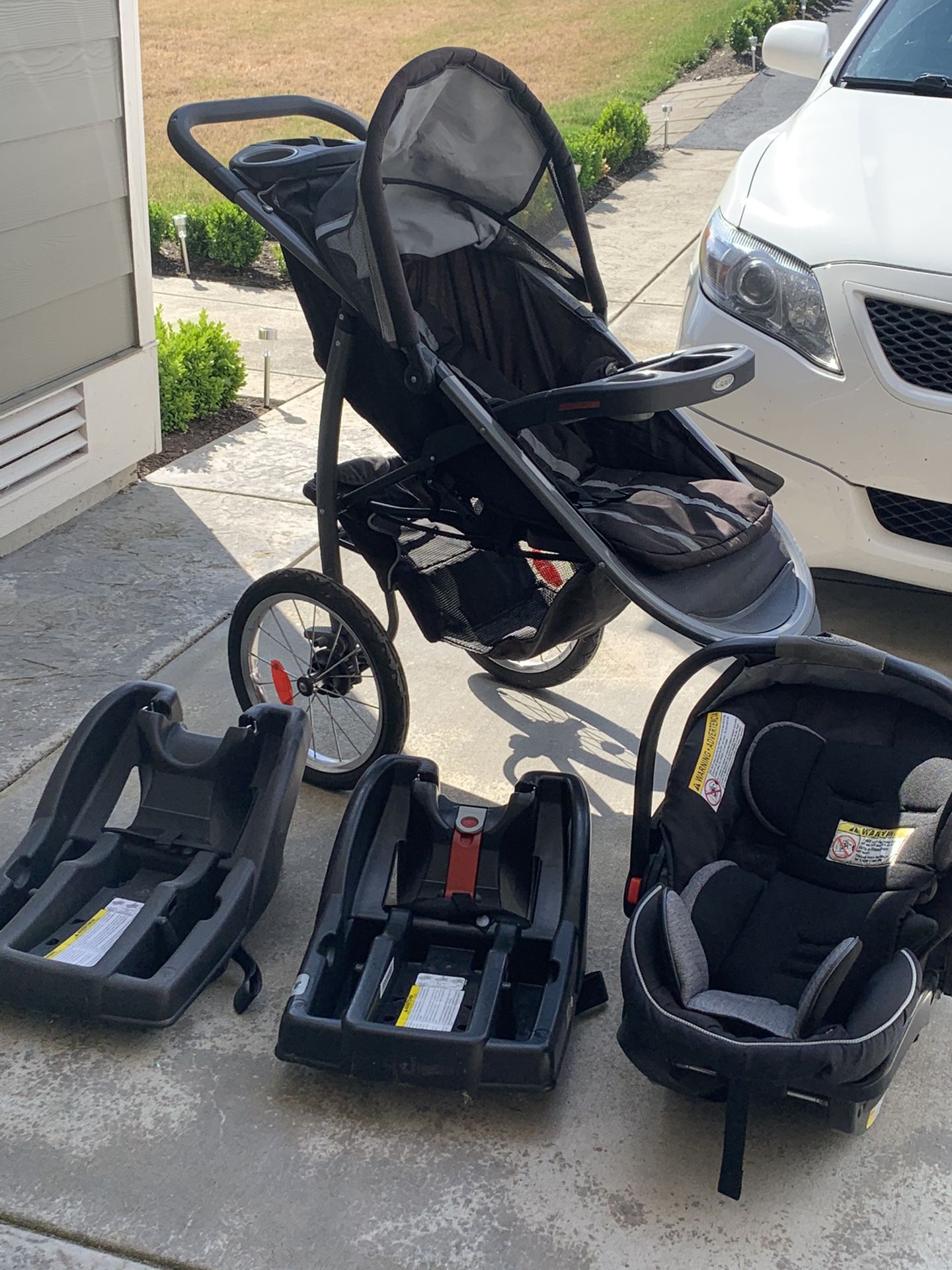 Stroller, car seat, and car seat base