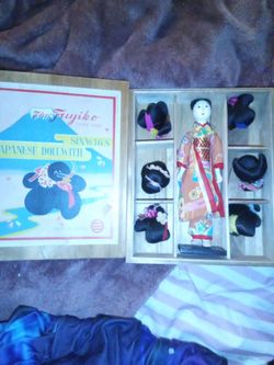1950s Japanese doll with six wigs