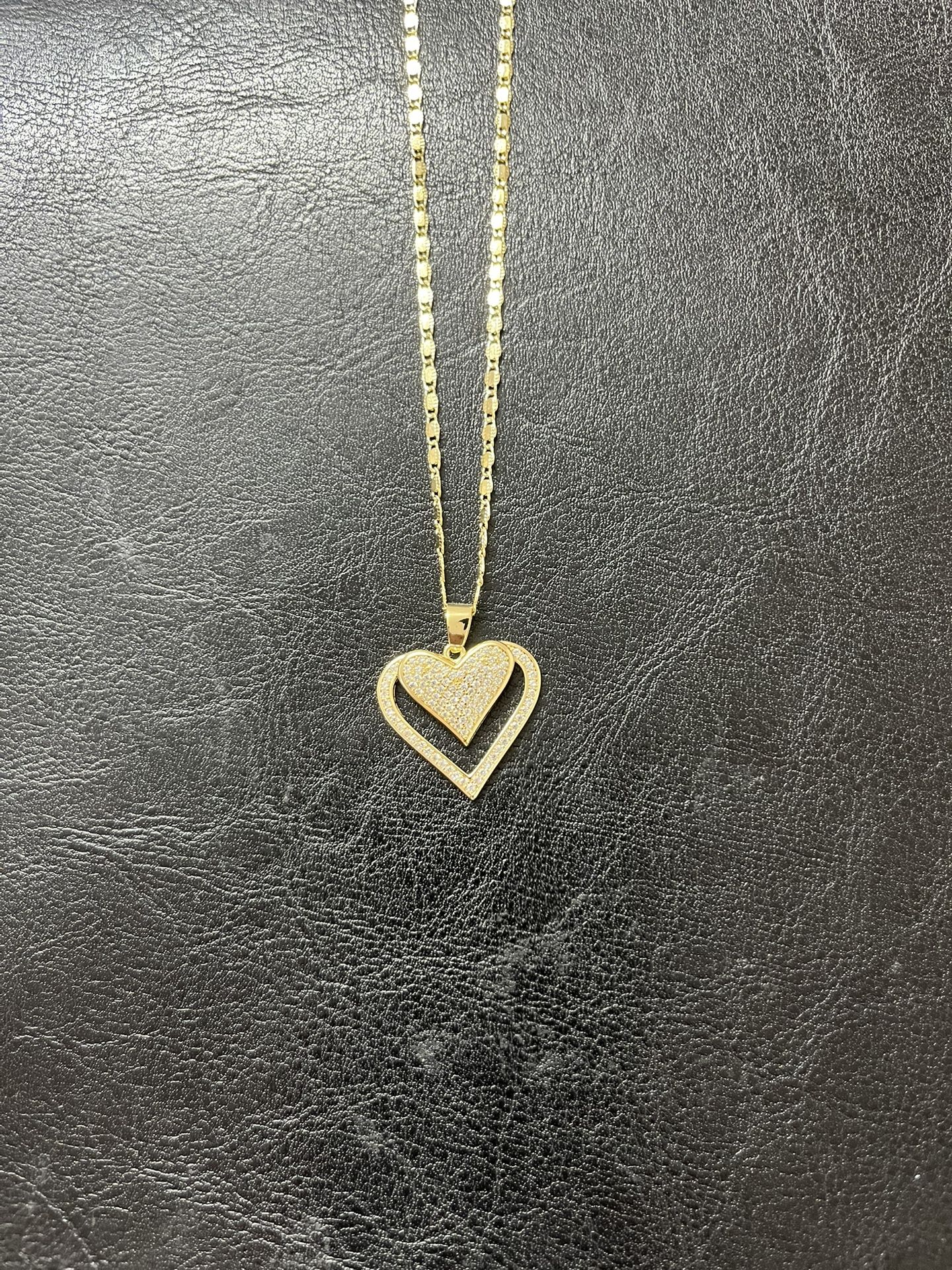 14 k gold plated heart pendant with chain.