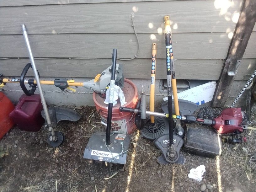 2 Trimmers And 7 Attachments