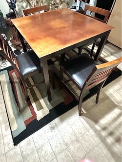 Table and chairs bar style height