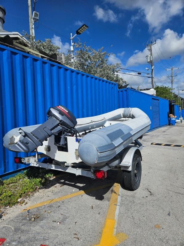 2011 Inflatable Rescue Boat 14’ w/ Trailer