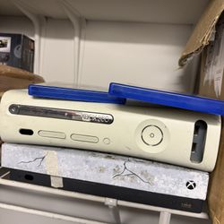 Xbox 360 And X-box 1 console with about 15 games.