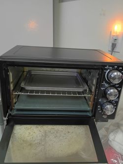 Oster convection toaster coven toaster oven. Retails for $130 excellent condition Great for home or campers.   cash only please