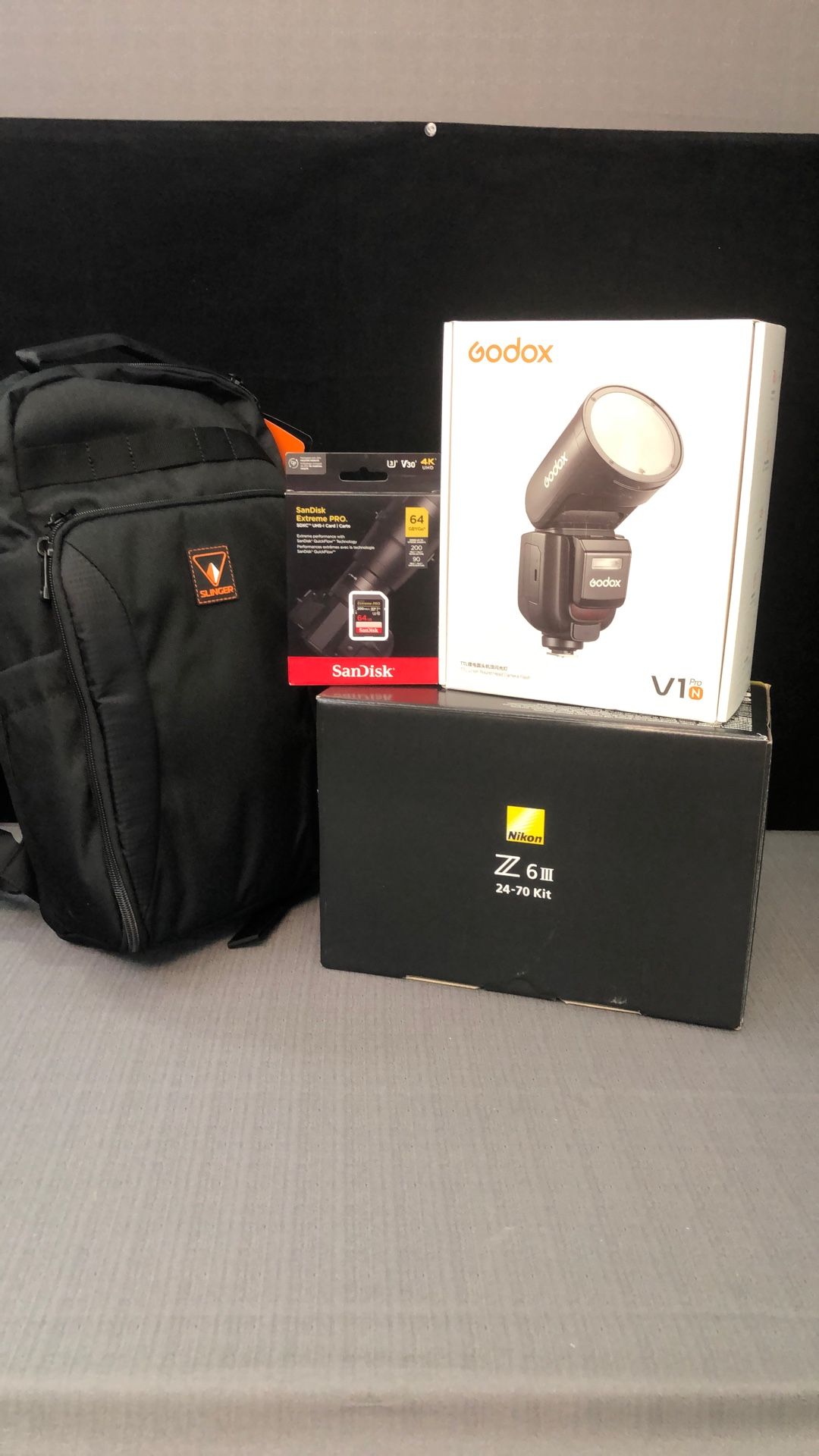 Nikon Z6 III with 24-70mm f/4 Godox V1Pro, Camera Bag and SD Card - Pro Bundle