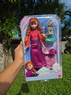 Disney Frozen Anna Fashion Doll & Wolf Cub Figure with 4 Nurturing Accessories Inspired by Movie