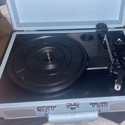 Crosley Record Player . Light blue black & silver . 