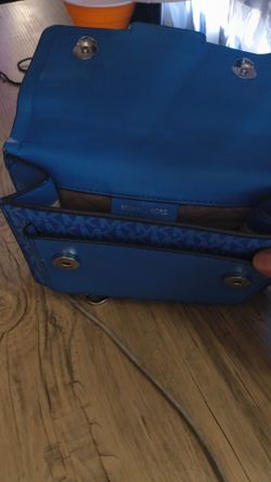 Light blue crossbody Michael Kors purse