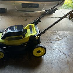 $125$.  40V HP Brushless 20 in. Cordless Battery Walk Behind Push Lawn Mower with 6.0 Ah Battery and Charger 