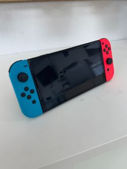 Nintendo Switch - OLED Model w/ Neon Red & Neon Blue Joy-Con (HEG-001) Good