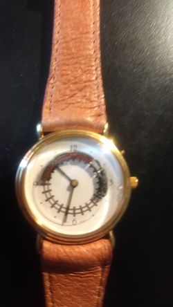 Watch with moving train