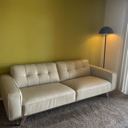 MUST GO THIS WEEKEND! Real leather cream couch- Like New!!180$-OBO!!