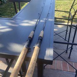 Two Shimano Convergents fishing rods