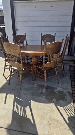 Wooden dining table and chairs