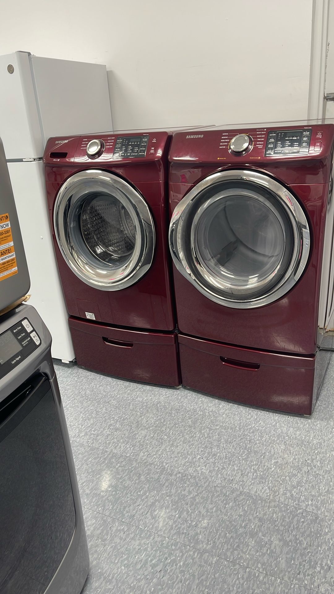 Used Samsung Front Washer And Dryer Set On Pedestal. I Year Warranty