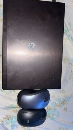 HP Laptop with Two Logitech Mice