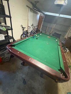 Pool table with ping pong topper
