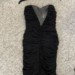 Sleeveless women’s small black dress