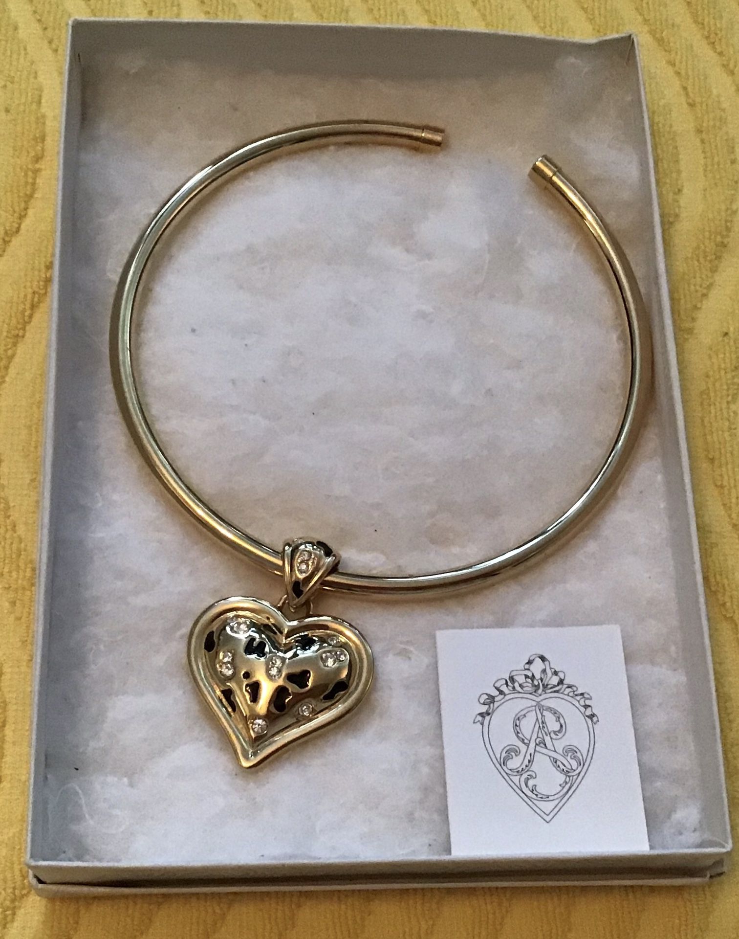 Gorgeous necklace. Double sided heart. This would make a lovely gift. Brand new. Never worn