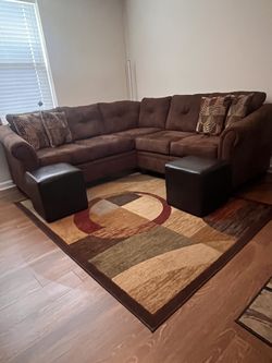 Sectional sofa set with area rug