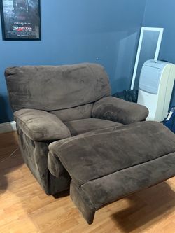 2 brown recliners