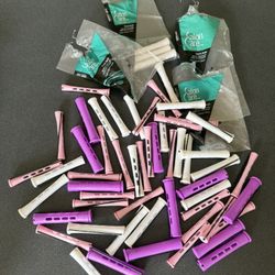 Pink white and purple new rollers for curling and waving hair 