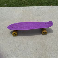Pink And Yellow Penny Board