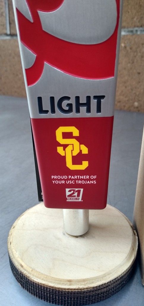 COORS LIGHT ( USC ) TAP HANDLE . ( ALSO PLENTY OF NEON SIGNS / LIGHTS AVAILABLE FOR SALE )DODGERS & ANGELS BOBBLEHEADS AVAILABLE.