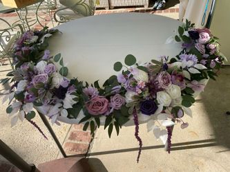 2 Artificial Flower Garland wreaths for table decor

Condition is used twice

Measurement of each arrangement left to right
Longest: 134 Inches long a