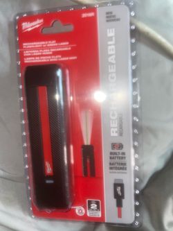 Milwaukee flat rechargeable flashlight and green laser