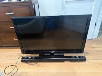 LG flat screen smart TV 42 inch with sound bar