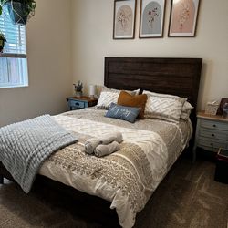 Queen bed with frame and bedding