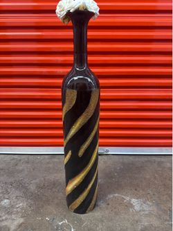 Tall Glass Vase with decor.