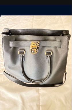 Mk purse size big  color black like new $150