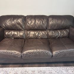 Brown faux leather couch